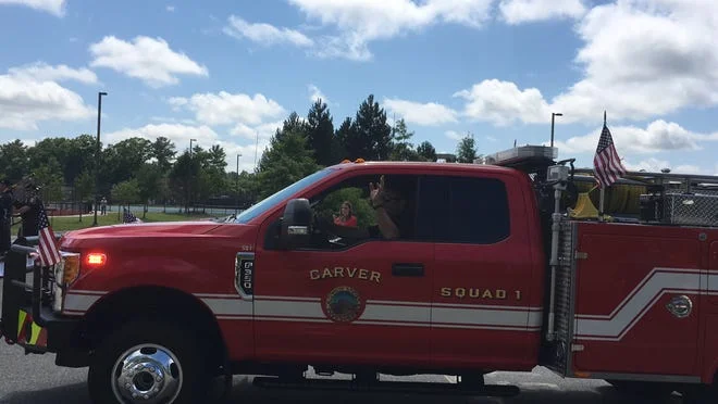 Firefighter driving fire truck vehicle