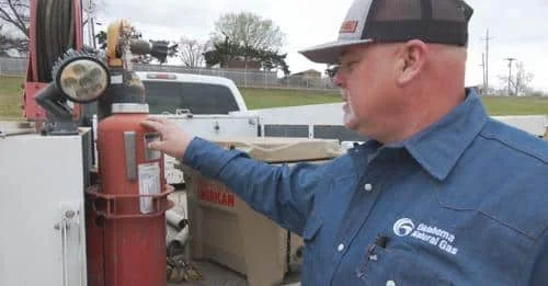 Man discusses using a fire extinguisher to help put out fire after crash